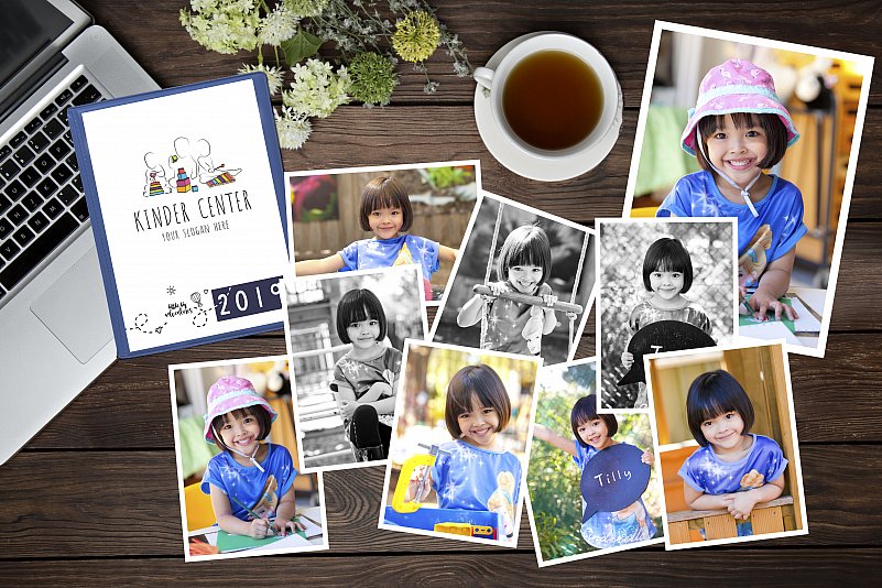 A Sample of Little Big Adventures photographic prints lie on a table for a parent to admire. There is also a hardcover kinder album in the image.